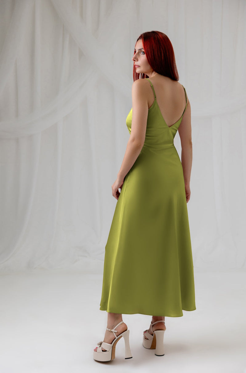 House of Lluvie' green satin lace dress, side view